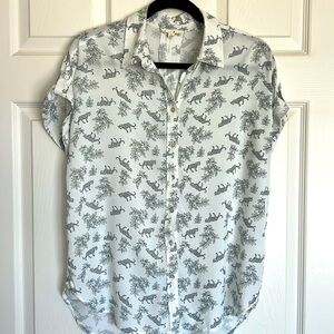 Short sleeve white shirt with black animals.